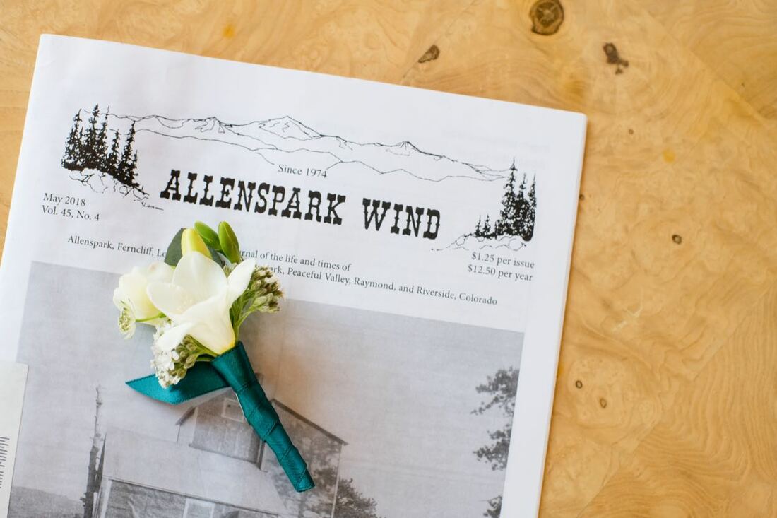 white teal boutonniere